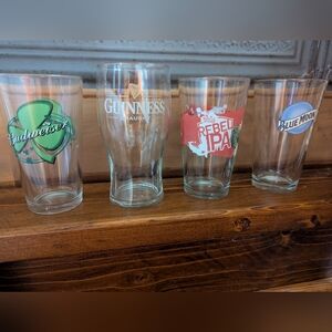 Pint Glasses From Popular Beer Brands Budweiser, Guinness, Rebel IPA, Blue Moon